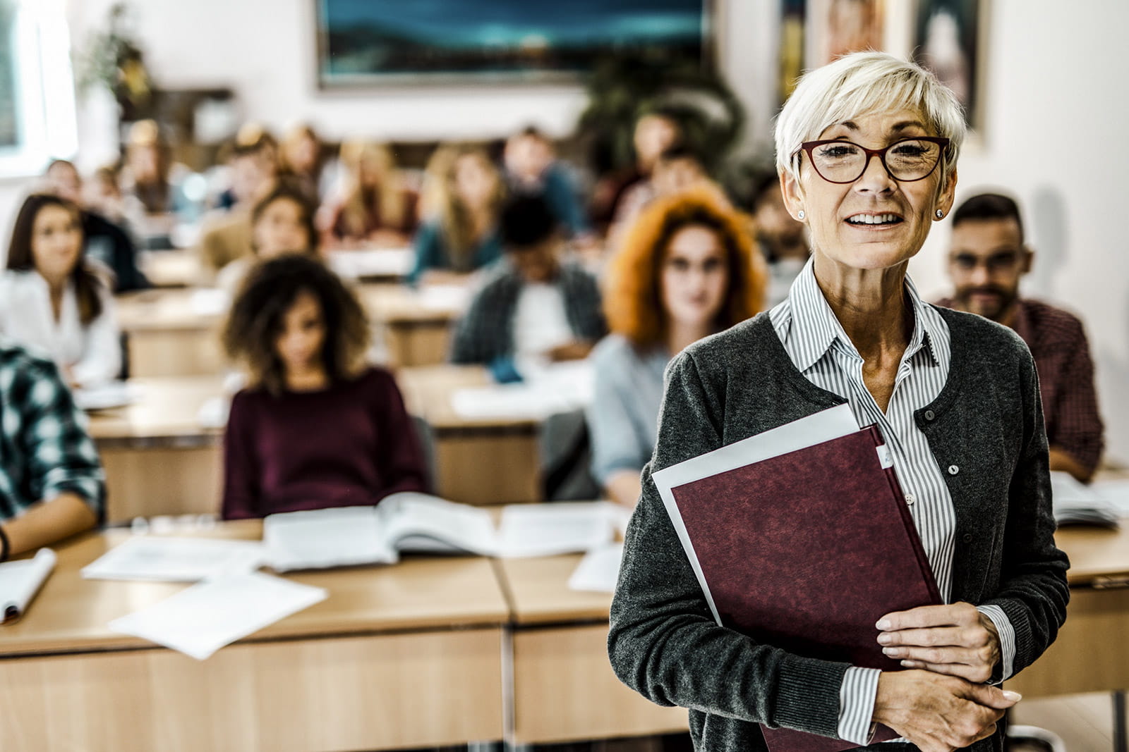 Teacher in front of adult class