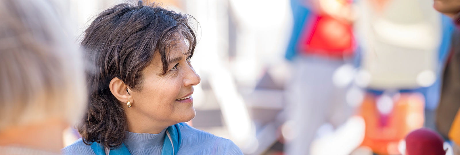 Woman talking with other woman