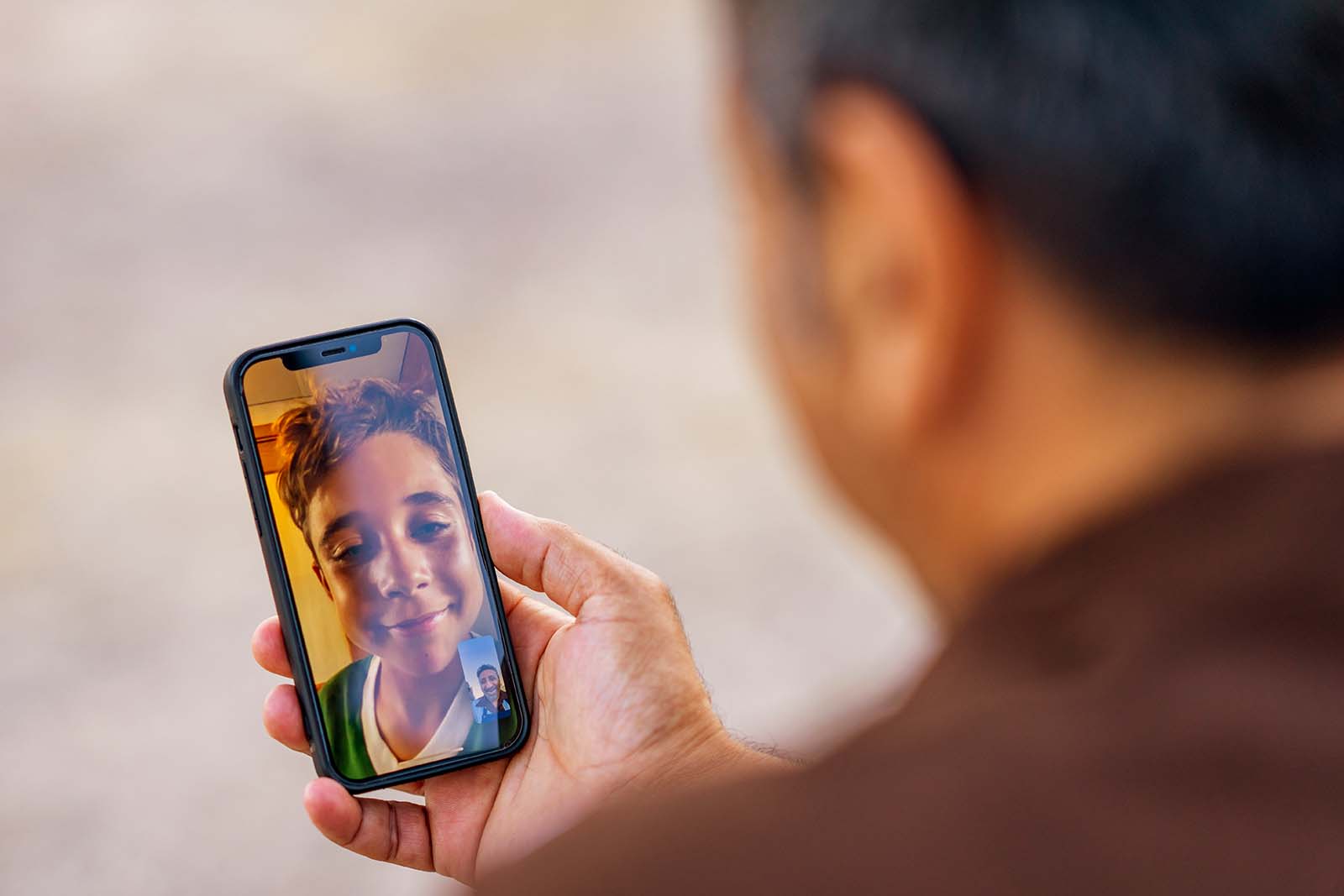 Man doing video chat on smartphone